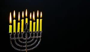 Jewish holiday hannukah low key image of jewish holiday Hanukkah with menorah traditional Candelabra